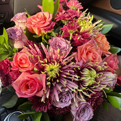 Bouquet of flowers in a car interior