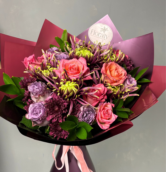 Bouquet of flowers with a 'Floraty' label on a grey background