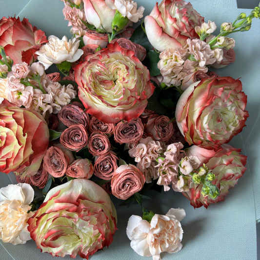 Bouquet of pink blush and cream flowers